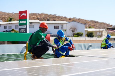 Puma Employees installing Solar Panels