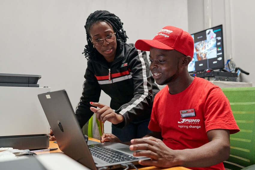 Female employee giving lubricants training